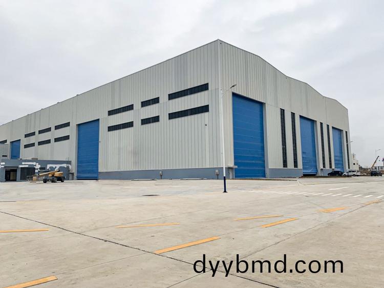 1654070471937344.jpg 廣東(dong)揭(jie)陽(yang)通(tong)用廠(chang)房柔(rou)性上疊門(men).jpg